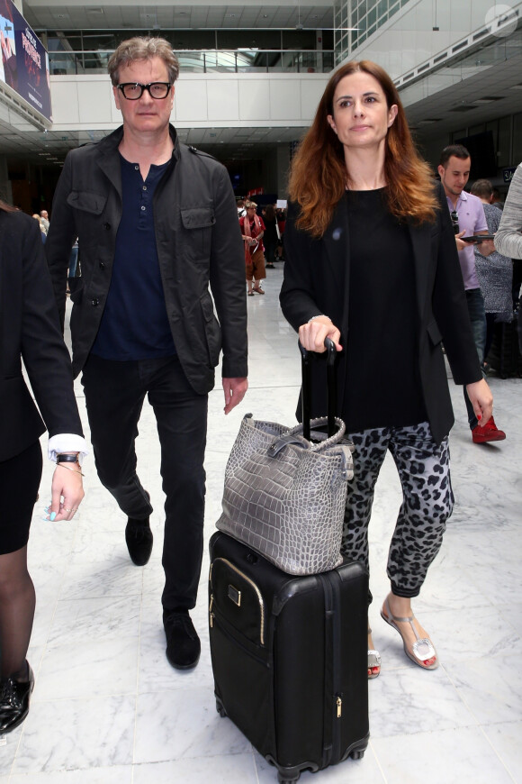 Colin Firth et sa femme Livia Giuggioli arrivent à l'aéroport de Nice en marge du 72ème Festival International du Film de Cannes, le 20 mai 2019.