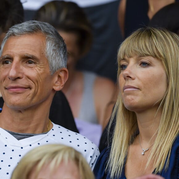 Nagui Fam et Mélanie Page dans les tribunes lors du quart de finale de la Coupe du Monde Féminine de football opposant les Etats-Unis à la France au Parc des Princes à Paris, France, le 28 juin 2019. Les USA ont gagné 2-1. © Pierre Perusseau/Bestimage