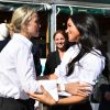 Meghan Markle, duchesse de Sussex et Misha Nonoo au magasin John Lewis sur Oxford Street pour le lancement de la collection capsule Smart Works à Londres le 12 septembre 2019.  The Duchess of Sussex (right) hugs designer Misha Nonoo at the launch the Smart Works capsule collection at John Lewis in Oxford Street, London.12/09/2019 - Londres