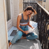Iris Mittenaere, au balcon de son appartement, à Paris. Mars 2020.