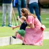 Catherine (Kate) Middleton, duchesse de Cambridge et le prince Louis de Cambridge lors d'un match de polo de bienfaisance King Power Royal Charity Polo Day à Wokinghan, comté de Berkshire, Royaume Uni, le 10 juillet 2019.