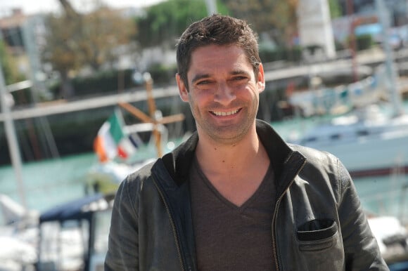 Guillaume Carcaud pose pour le photocall de la série "VDM" durant le 15e Festival de la Fiction Tv de La Rochelle le 13 septembre 2013.