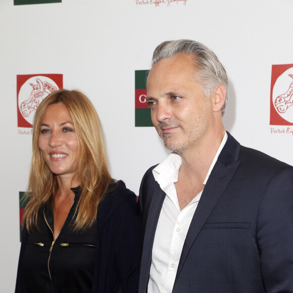 Exclusif - Mathilde Seigner et son compagnon Mathieu Petit - Jour 3 - Longines Global champions tour Paris Eiffel Jumping présenté par Gucci, au Champ de Mars à Paris le 6 juillet 2014.