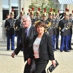 Martine Aubry et son mari Jean-Louis Brochen - Investiture de François Hollande comme président de la République, à Paris, en 2012.