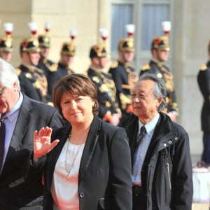 Martine Aubry et son mari Jean-Louis Brochen - Investiture de François Hollande comme président de la République, à Paris, en 2012.