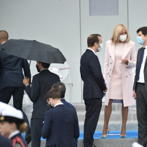 Sébastien Lecornu, ministre des outre mer, la première dame Brigitte Macron, Julien Denormandie, ministre de l'agriculture et de l'alimentation lors de la cérémonie du 14 juillet à Paris le 14 juillet 2020. © Eliot Blondet / Pool / Bestimage