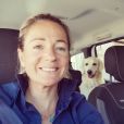 Anne-Laure Sibon avec son chien, dans le Gers, le 18 juillet 2020