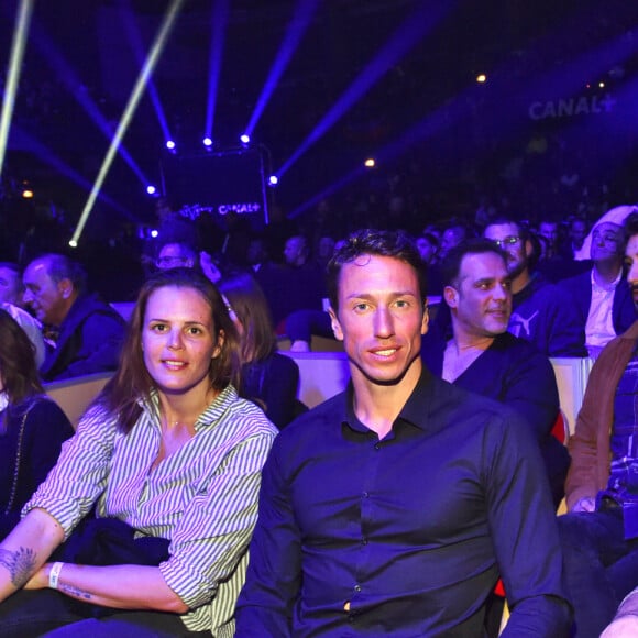 Laure Manaudou, Frédérick Bousquet (ex-compagnon de Laure Manaudou, ils sont parents d'une petite Manon née en 2010), Jérémy Frérot, son compagnon (en arrière plan) et son frère à droite, Florent Manaudou lors du gala de boxe organisé par Univent Production au Palais des Sports de Marseille le 24 mars 2018. © Bruno Bebert/Bestimage