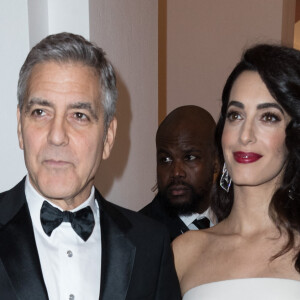 Amal Alamuddin et son mari George Clooney très complice lors de la 42ème cérémonie des César à la salle Pleyel à Paris le 24 février 2017. © Olivier Borde / Dominique Jacovides / Bestimage