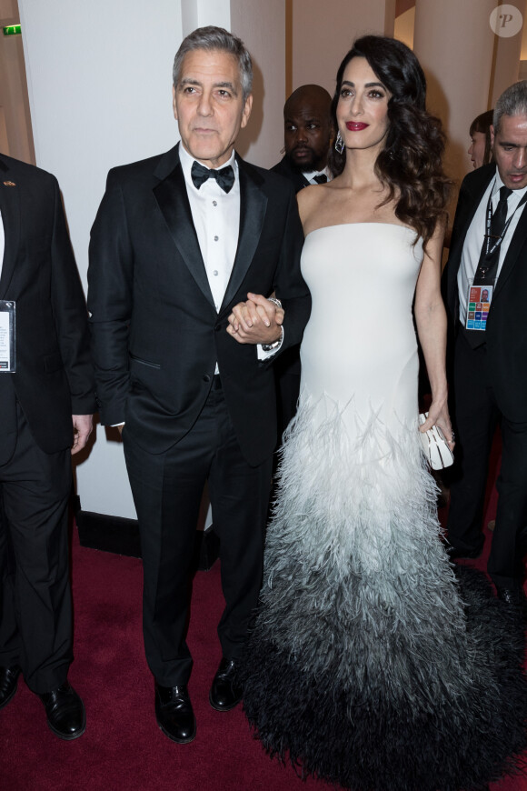 Amal Alamuddin et son mari George Clooney très complice lors de la 42ème cérémonie des César à la salle Pleyel à Paris le 24 février 2017. © Olivier Borde / Dominique Jacovides / Bestimage