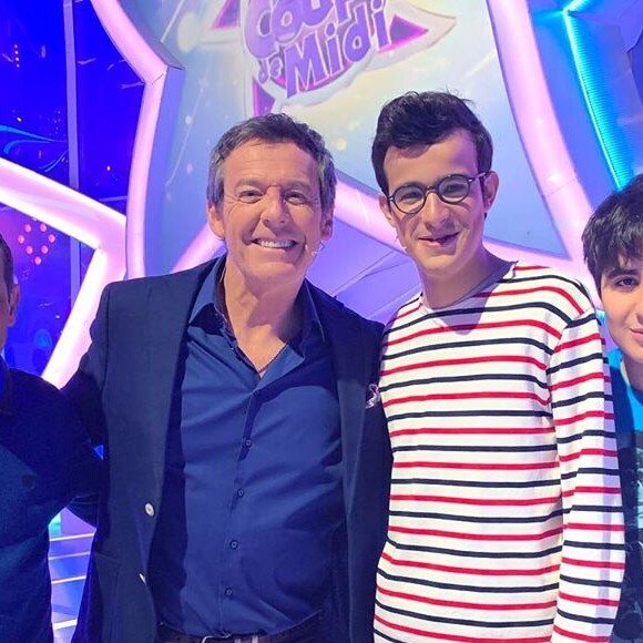 Jean-Luc Reichmann avec Paul et sa famille, dans "Les 12 Coups de midi", le 22 mai 2019