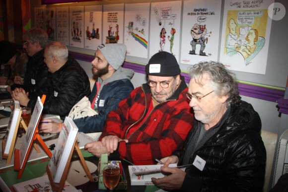 Exclusif - Tristan Lopin, Denis Pessin et Gabs - Dédicace des auteurs et dessinateurs du livre "Les homophobes sont-ils des enculés?" au bénéfice de l'association "SOS Homophobie" au Mange-Disque à Paris, le 5 décembre 2017. © Baldini/Bestimage