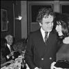 Archives- Guy Beart et Juliette Gréco en soirée à Paris, en 1976. 