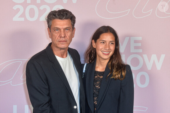 Marc Lavoine et Line Papin - Photocall du défilé Etam Live Show 2020 à Paris le 29 septembre 2020. © Pool Agence Bestimage