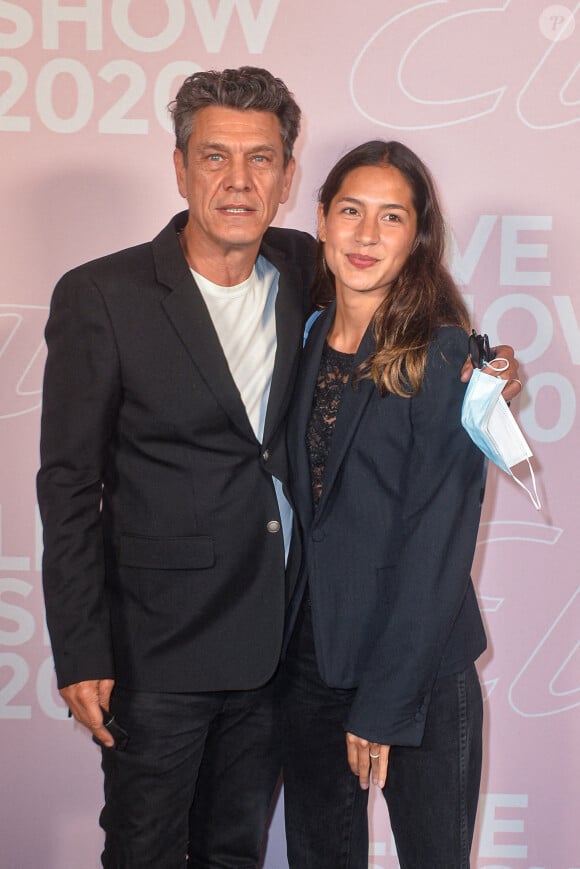 Marc Lavoine et Line Papin - Photocall du défilé Etam Live Show 2020 à Paris le 29 septembre 2020. © Pool Agence Bestimage