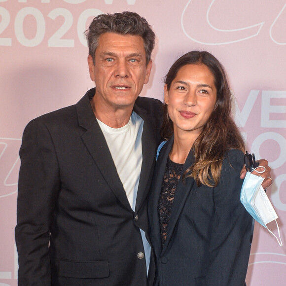 Marc Lavoine et Line Papin - Photocall du défilé Etam Live Show 2020 à Paris le 29 septembre 2020. © Pool Agence Bestimage