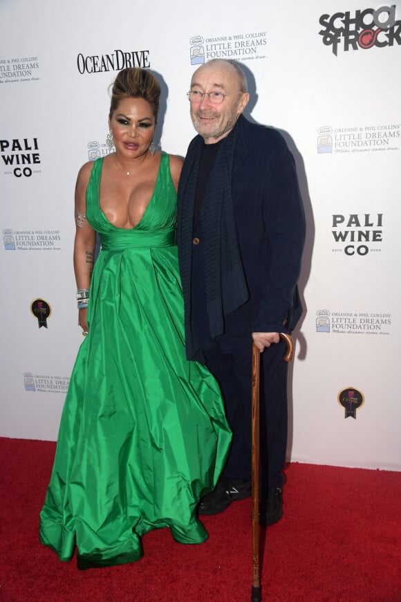Phil Collins et sa femme Orianne au photocall du 4ème gala de la fondation Little Dreams à Miami le 15 novembre 2018.