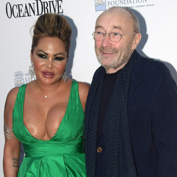 Phil Collins et sa femme Orianne au photocall du 4ème gala de la fondation Little Dreams à Miami le 15 novembre 2018.