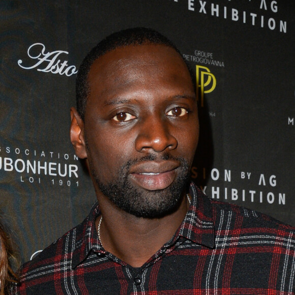 Omar Sy et sa femme Hélène au vernissage de l'exposition "Vision by AG", au profit de l'association caritative CeKeDuBonheur, à la Piscine Molitor à Paris, le 30 novembre 2016. © Guirec Coadic/Bestimage 