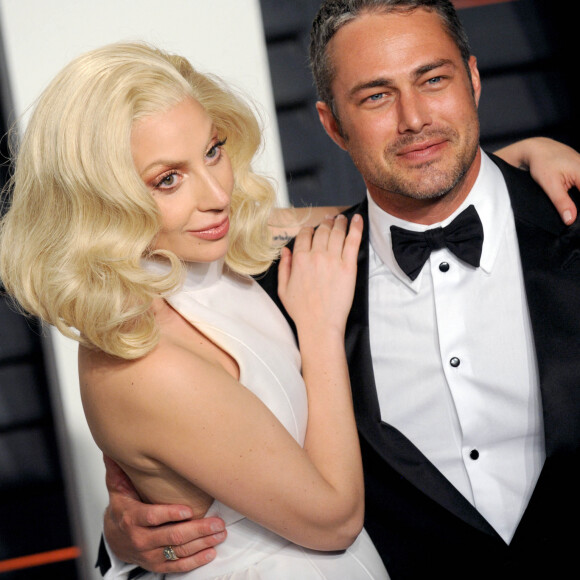 La chanteuse Lady Gaga et son compagnon Taylor Kinney - People à la soirée "Vanity Fair Oscar Party" après la 88e cérémonie des Oscars à Hollywood.