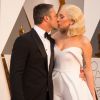 Lady Gaga et son compagnon Taylor Kinney - Arrivées à la 88e cérémonie des Oscars à Hollywood, le 28 février 2016.