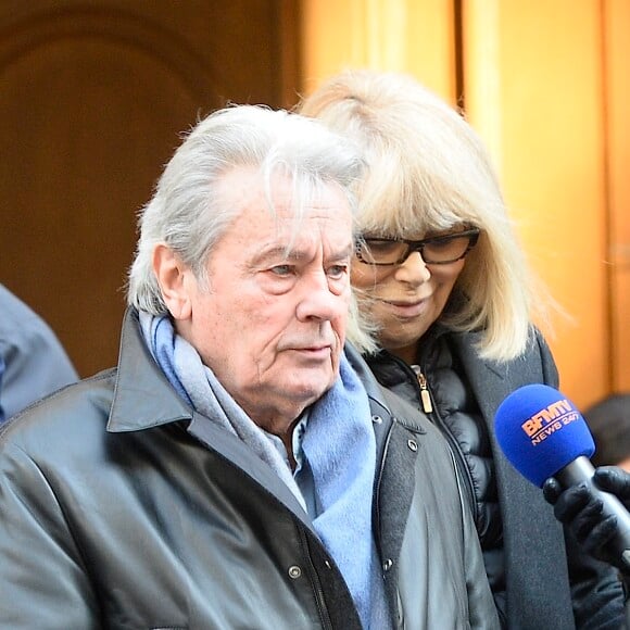 Alain Delon et Mireille Darc - Hommage a Georges Lautner en l'eglise Saint-Roch à Paris. Le 5 decembre 2013