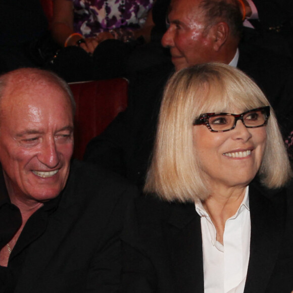Archive - Alain Delon, Mireille Darc et son mari Pascal Desprez lors du gala de l'IFRAD à Paris, France, le 18 Septembre 2013. © Agence/Bestimage
