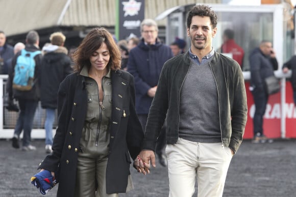 Tomer Sisley et sa femme Sandra lors de la 100ème édition du Grand Prix d'Amérique sur l'hippodrome de Vincennes à Paris, France, le 26 janvier 2020.