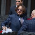 Johnny Depp arrive à la Royal Courts of Justice à Londres, été 2020.