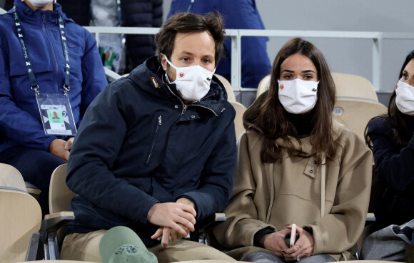 Vianney Bureau et sa compagne Catherine Robert en tribune lors des internationaux de tennis de Roland Garros à Paris le 4 octobre 2020. © Dominique Jacovides / Bestimage