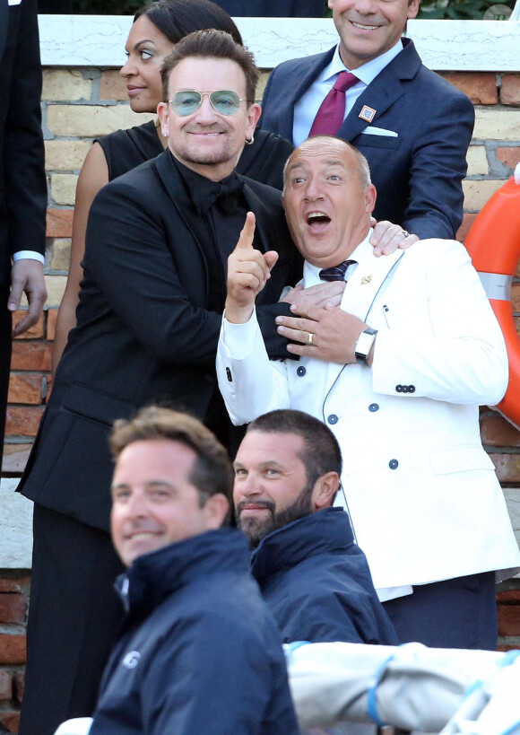Bono - George Clooney et ses invités se rendent à son mariage avec Amal Alamuddin à Venise, le 27 septembre 2014.