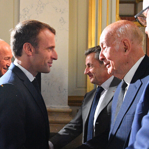 Le président de la République française Emmanuel Macron, le président du Conseil constitutionnel français Laurent Fabius et les membres du Conseil constitutionnel français Valery Giscard d'Estaing et Nicolas Sarkozy. © Christian Liewig/Pool/Bestimage 