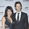 Romain Grosjean et sa femme Marion Jolles enceinte au dîner de Gala du 92eme Grand Prix d' Amerique au Grand Palais a Paris le 26 Janvier 2013.