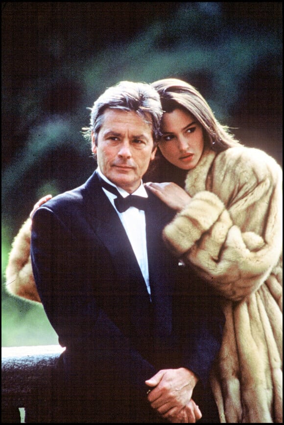 Monica Bellucci et Alain Delon en 1989.