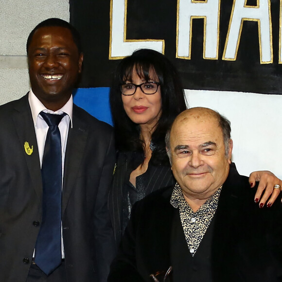 Souleymane S. (Victime d'un groupe de supporteurs racistes de Chelsea dans le métro parisien), Yamina Benguigui, Jean Benguigui - Dîner des parrains et marraines de SOS Racisme à Paris le 3 mars 2015.
