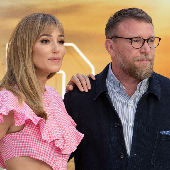 La maison de Guy Ritchie, ici photographié avec sa femme Jacqui Ainsley, a été cambriolée.