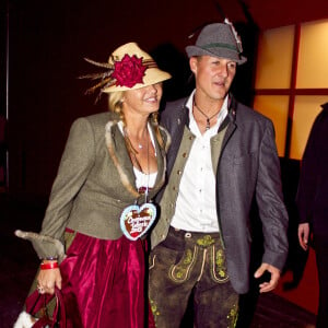 Michael Schumacher et sa femme Corinna lors de la soiree Oktoberfest a Munich le 1er octobre 2013.