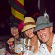 Michellle Yeoh, Michael Schumacher et sa femme Corinna lors de la soiree Oktoberfest a Munich le 1er octobre 2013.