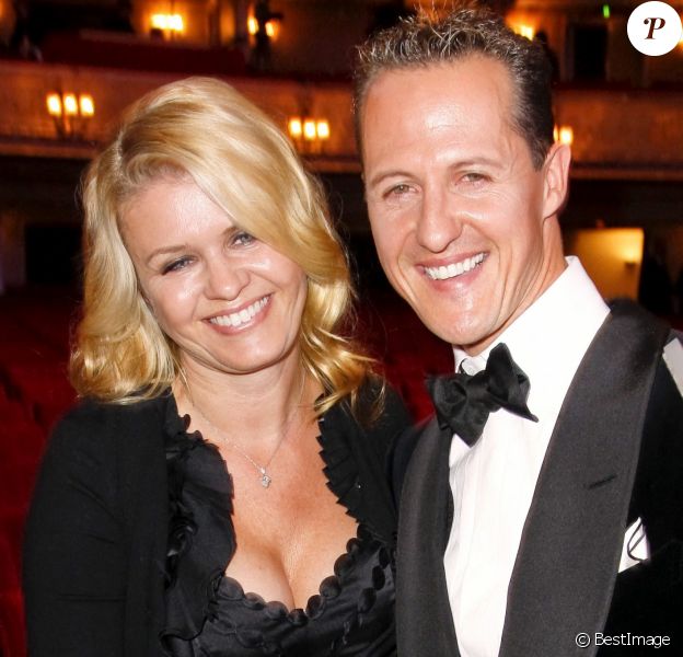 Michael Schumacher et sa femme Corinna lors de la soiree GQ a Berlin en Allemagne