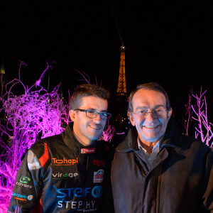 Jean-Pierre Pernaut et son fils Olivier Pernaut - Présentation de la nouvelle voiture de Margot Laffite, Jean-Pierre et Olivier Pernaut pour le trophée Andros à Paris le 26 novembre 2015. La compagnie des Bateaux-Mouches est leur partenaire officiel. © Lionel Urman / Bestimage