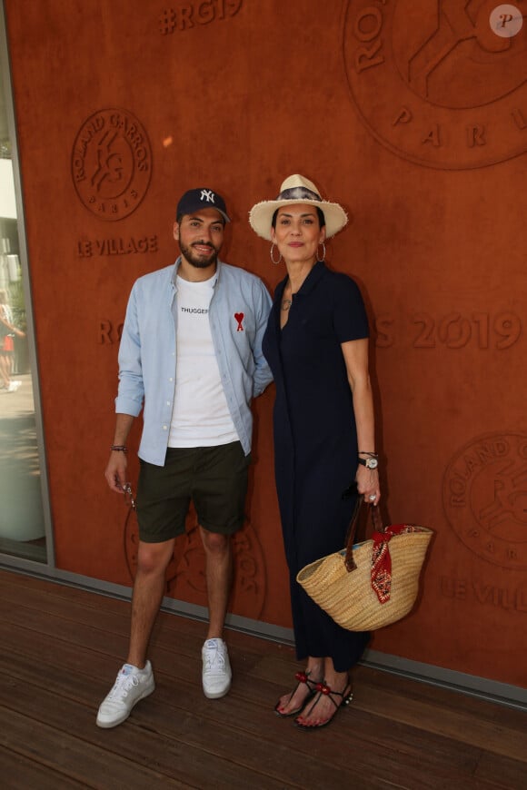 Cristina Cordula son fils Enzo au village lors des internationaux de tennis de Roland Garros à Paris, France, le 2 juin 2019. © Jacovides-Moreau/Bestimage