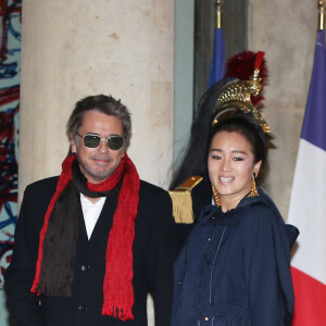 Info - Jean-Michel Jarre officialise avec Gong Li - Jean-Michel Jarre et sa compagne Gong Li - Dîner d'Etat du président de la République française en l'honneur du président de la République populaire de Chine lors de sa visite d'Etat en France du 24 au 26 mars 2019, au Palais de l'Elysée, à Paris, France, le 25 mars 2019. © Dominique Jacovides/Bestimage