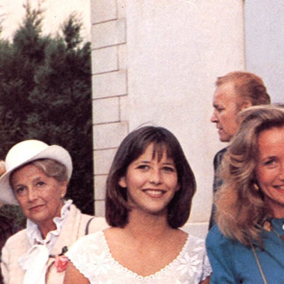 Sophie Marceau, Brigitte Fossey, Claude Brasseur sur le tournage du film "La Boom 2" en 1982.