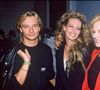 David Hallyday, Estelle Lefébure et Sylvie Vartan en coulisses d'un défilé de mode, dans les années 90.