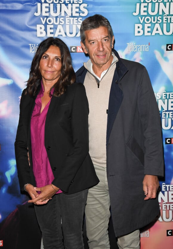 Michel Cymes et sa femme Nathalie - Avant-première du film "Vous êtes jeunes, vous êtes beaux" au cinéma Gaumont Opéra à Paris. © Coadic Guirec/Bestimage 