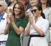Catherine (Kate) Middleton, duchesse de Cambridge, Meghan Markle, duchesse de Sussex, dans les tribunes lors de la finale femme de Wimbledon "Serena Williams - Simona Halep" à Londres. © Ray Tang/London News Pictures via Zuma Press/Bestimage