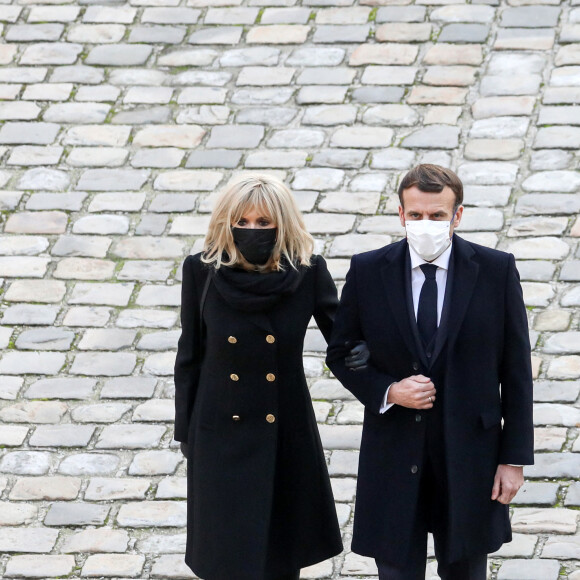 Le président de la république, Emmanuel Macron accompagné de la première dame Brigitte Macron lors de l'hommage national rendu à Daniel Cordier aux Invalides, à Paris le 26 novembre 2020, Paris. © Stéphane Lemouton / Bestimage