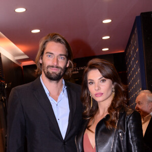 Camille Lacourt et sa compagne Alice Detollenaere (Miss Bourgogne 2010) lors de la soirée de réouverture de la boutique "Breitling", située rue de la Paix. Paris, le 3 octobre 2019. © Rachid Bellak/Bestimage 