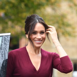 Le prince Harry, duc de Sussex, et Meghan Markle, duchesse de Sussex, arrivent pour une réunion sur l'égalité des genres avec les membres du Queen's Commonwealth Trust (dont elle est vice-présidente) et du sommet One Young World au château de Windsor, le 25 octobre 2019. 