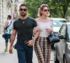 Wilmer Valderrama et sa compagne Amanda Pacheco se promènent avenue Montaigne à Paris, le 23 juin 2019.